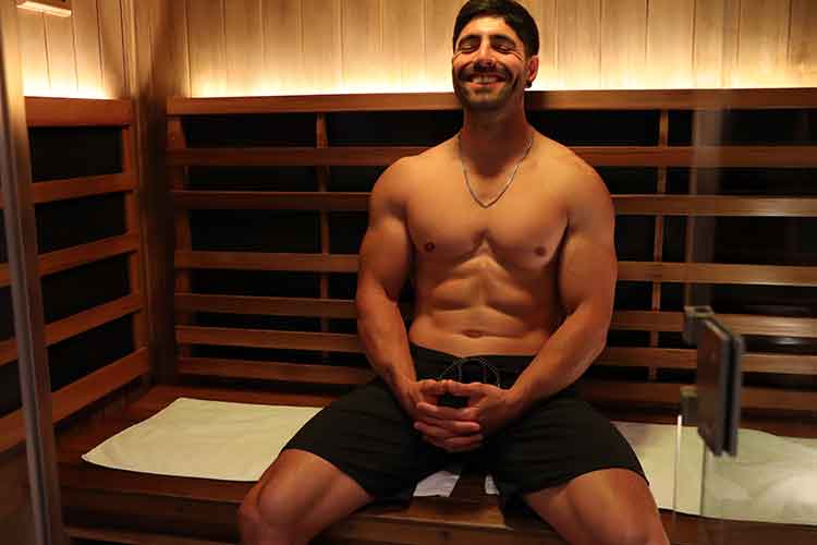 A man in an infrared sauna at CalmBar in Rozelle Sydney